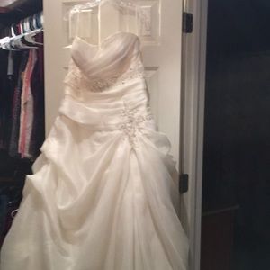 Lovely ivory strapless wedding gown